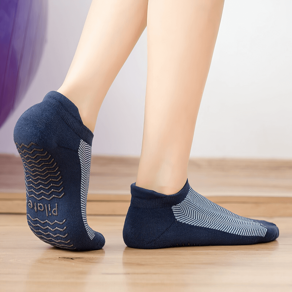 Women's non-slip breathable pilates socks with combed cotton for yoga and dance in navy color, showcasing grip pattern.